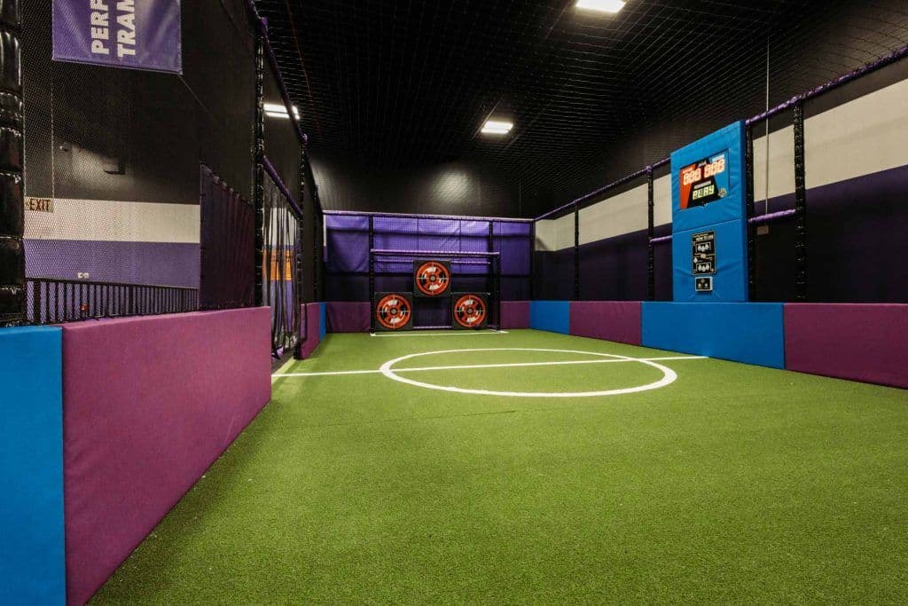 Inside a Next Level Parks installation at Altitude Woodbridge: a colorful, family-fun commercial trampoline park interior